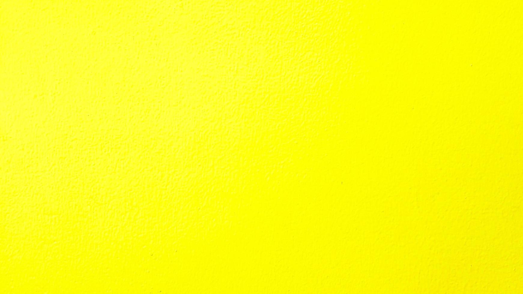 giallo dipinto parete per sfondo. colorato o pastello colore di calcestruzzo sfondo. foto