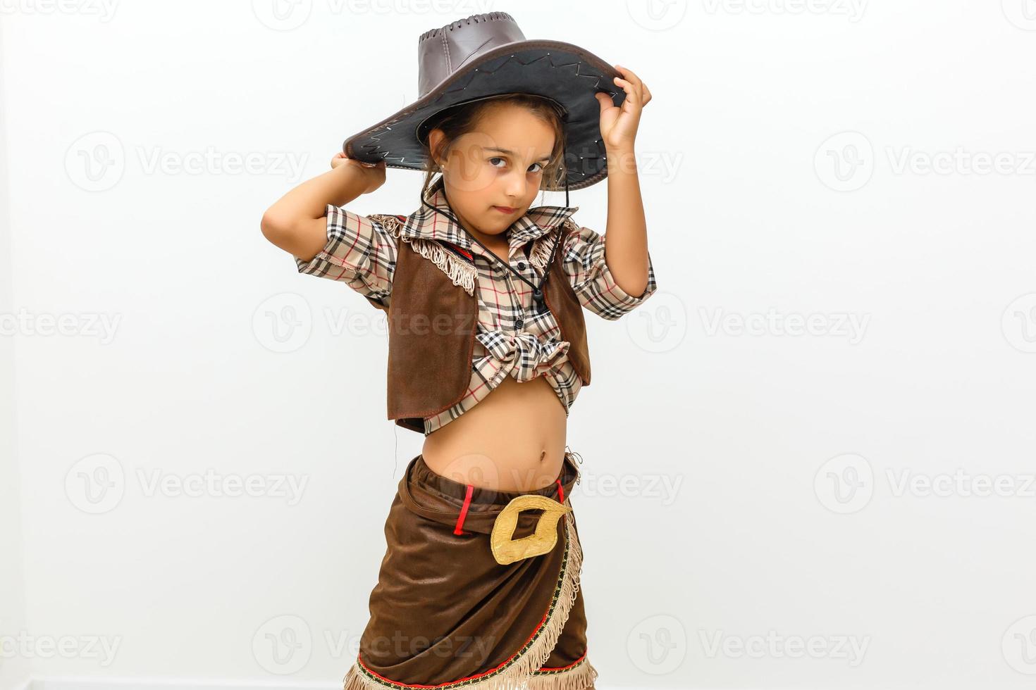 bellissimo poco ragazza nel cowboy cappello foto