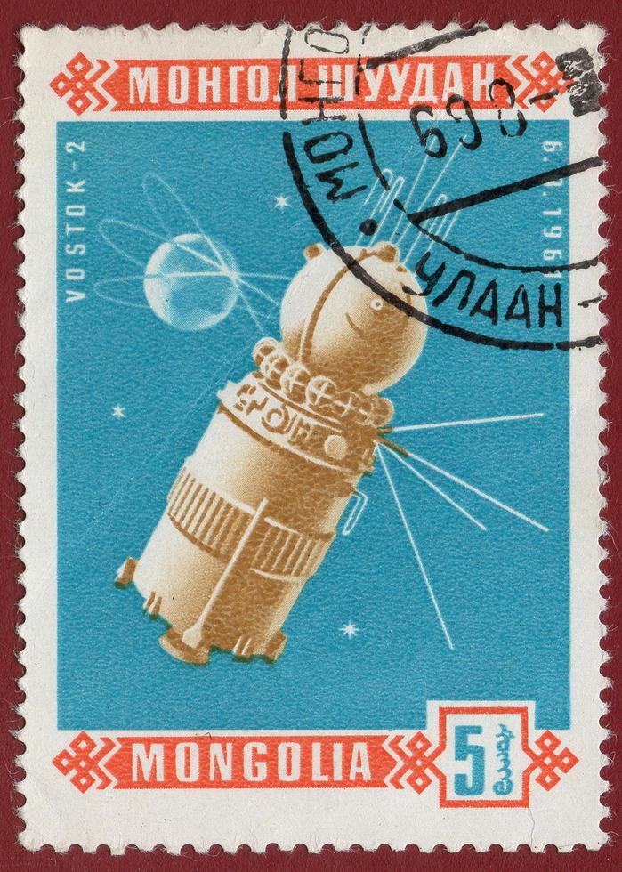 Mongolia - circa 1963 affrancatura francobollo stampato nel Mongolia Spettacoli sovietico navicella spaziale Vostok 2, il serie navicella spaziale urss. aprile 12 il giorno di cosmonautica foto