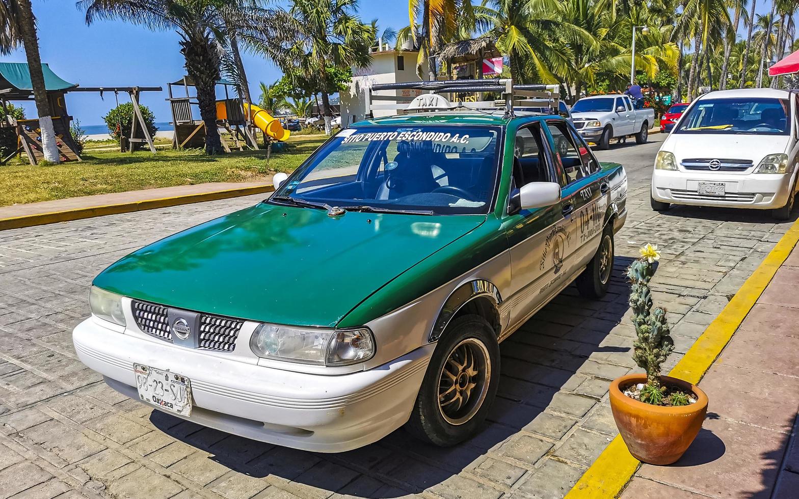 puerto escondido oaxaca Messico 2022 verde turchese blu Taxi taxi auto nel puerto escondido Messico. foto