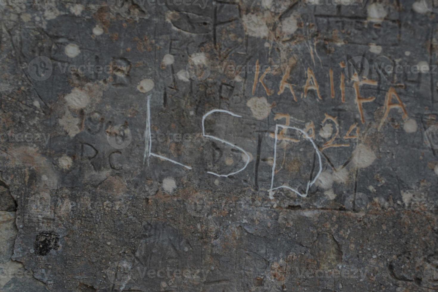 medina medievale villaggio pietra graffiti su edificio nel Malta foto