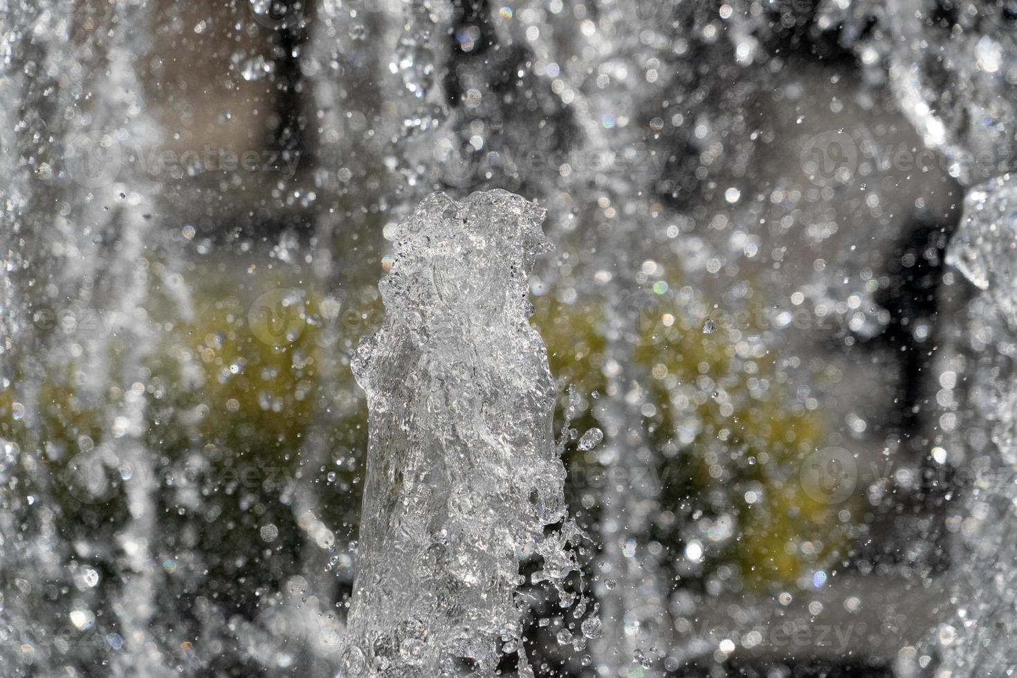 Fontana spruzzo acqua dettaglio vicino su foto