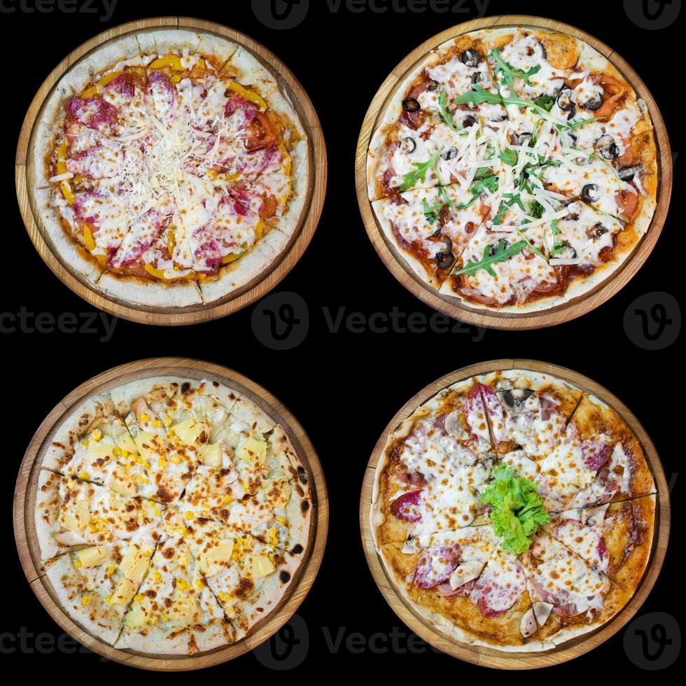 4 pizze superiore Visualizza su nero sfondo foto