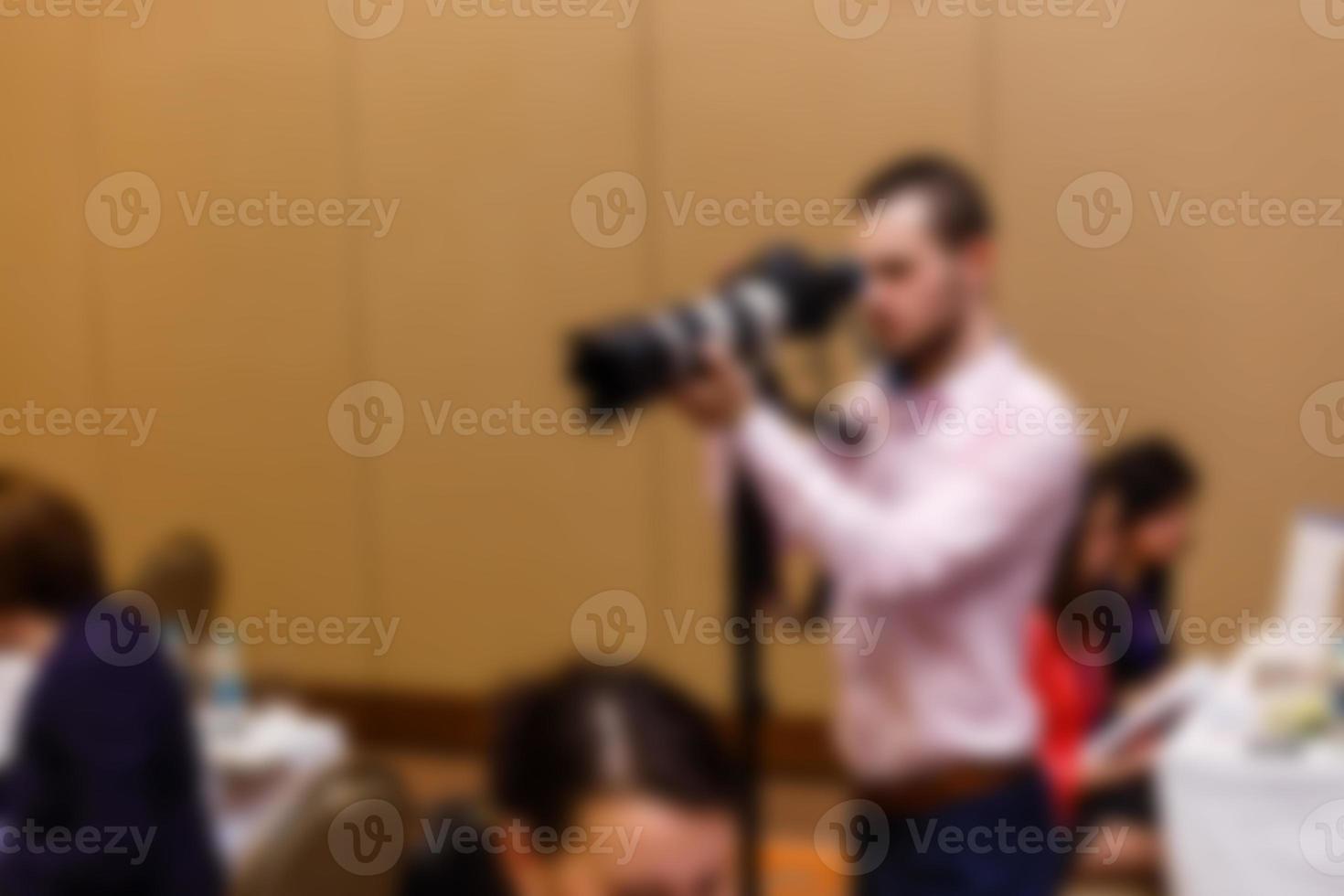 fotografo Tenere telecamera sfocato sfocatura foto