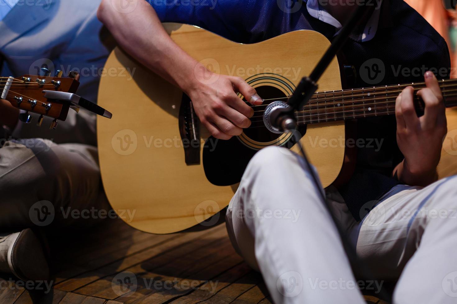 dettaglio di un' classico chitarra giocatore foto