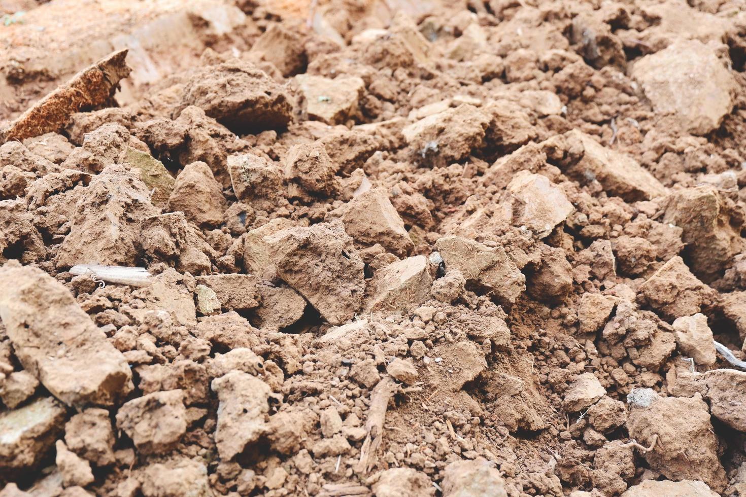 bene qualità suolo minerali nutrienti nel il suolo qualità per coltivazione, terra aratro pala per agricoltura, suolo struttura suolo sfondo foto