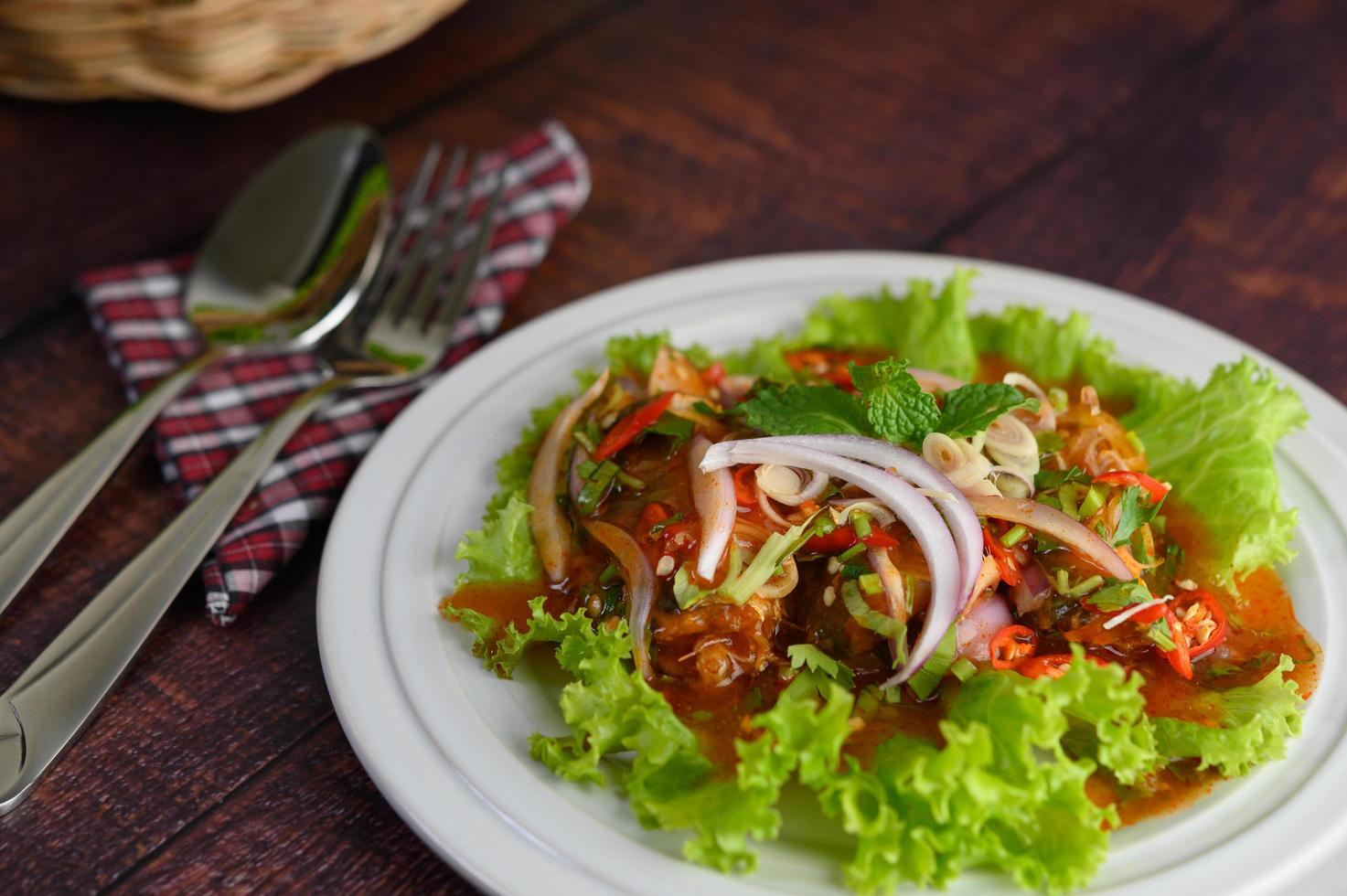 insalata piccante di sarde in salsa foto