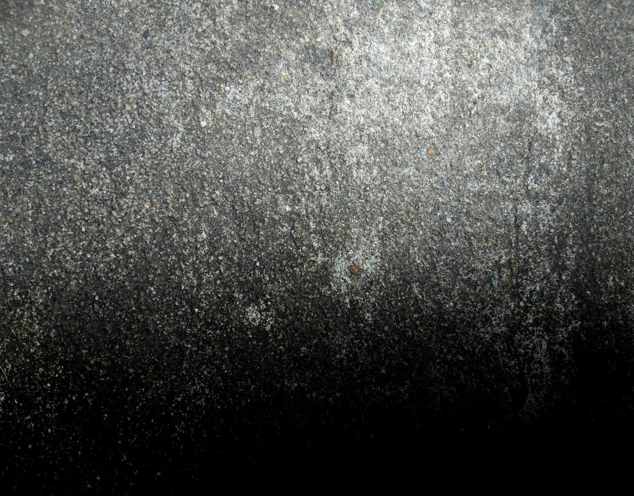 ruvido vecchio cemento parete sfondo pendenza leggero buio foto