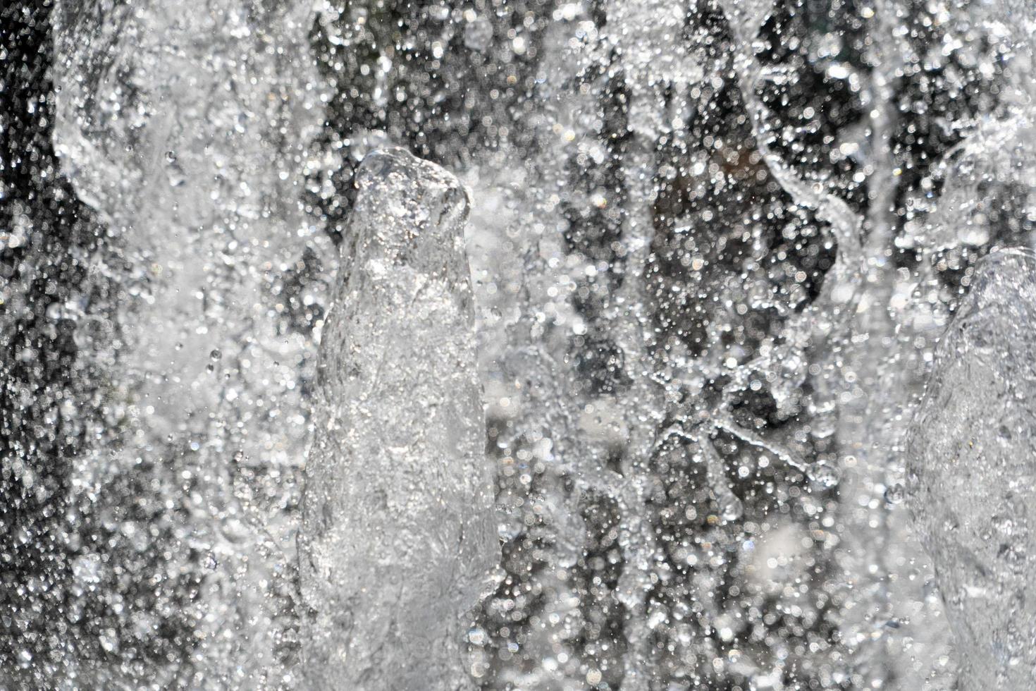 Fontana spruzzo acqua dettaglio vicino su foto