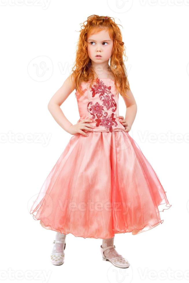 poco ragazza nel rosa vestito foto