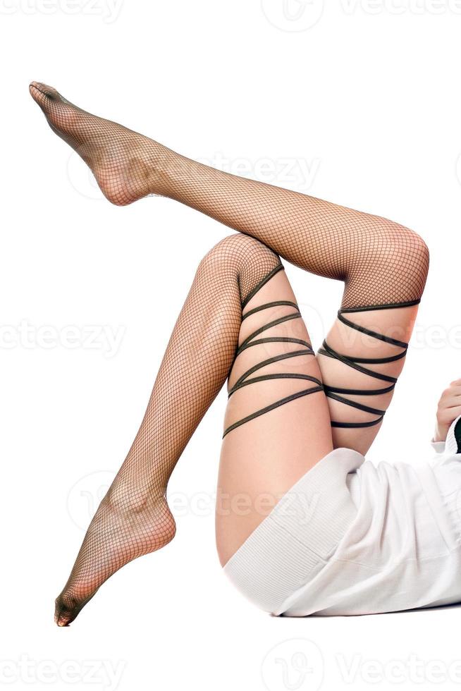 sexy formoso Da donna gambe nel collant. isolato su bianca foto