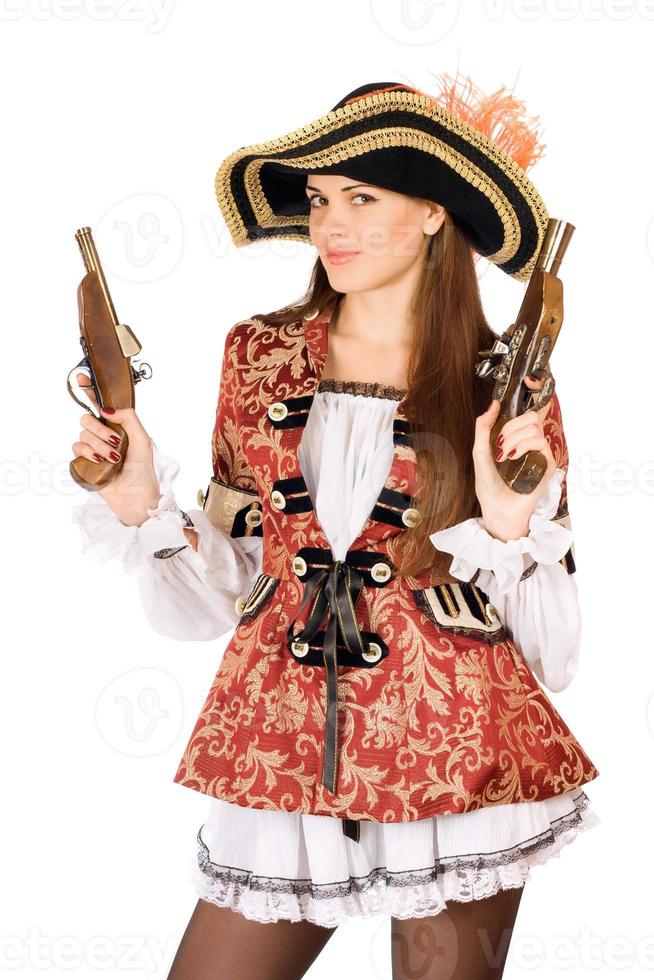 donna attraente con pistole vestite da pirati foto