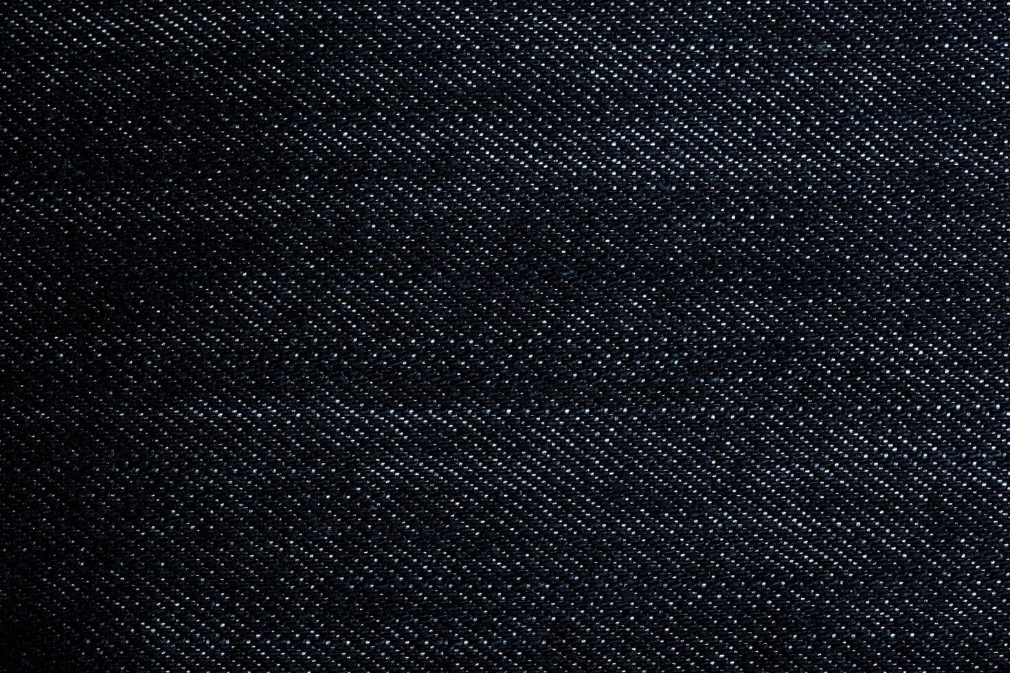 sfondo denim di cotone scuro foto