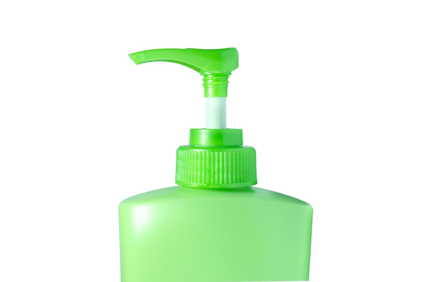 bottiglia verde della pompa foto