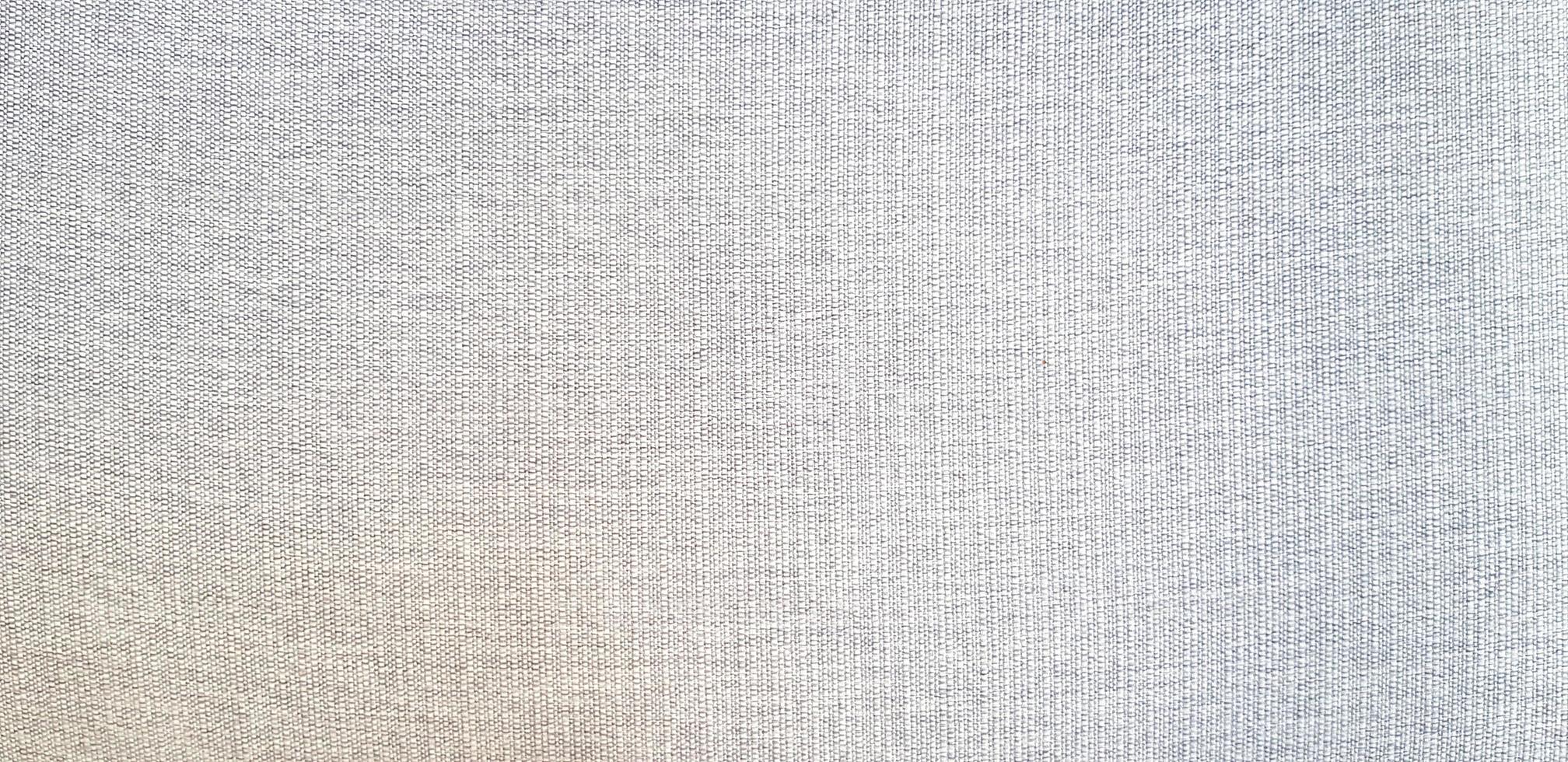 modello di leggero grigio o grigio cotone o tessuto e arte sfondo. superficie struttura astratto sfondo. foto
