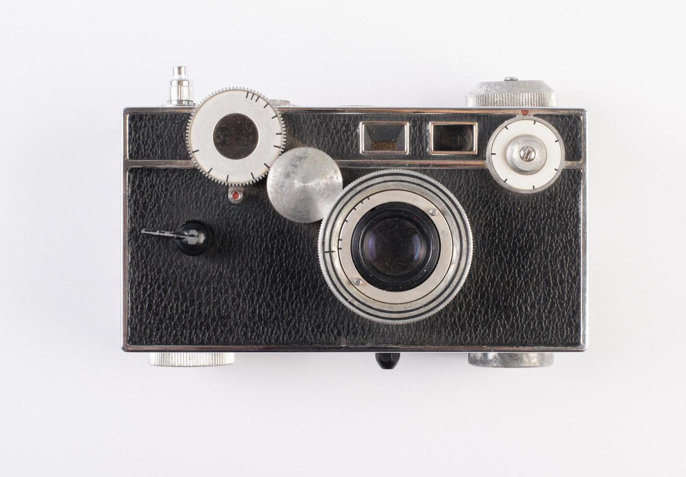 vecchia macchina fotografica vintage su sfondo bianco foto