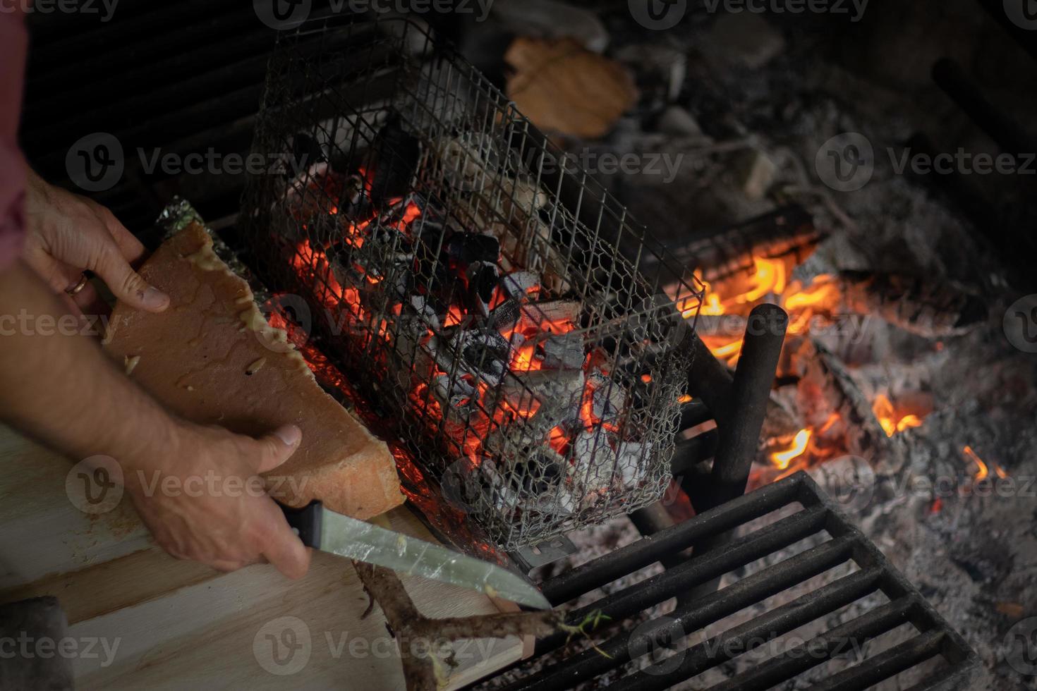 raclette fuoco formaggio foto