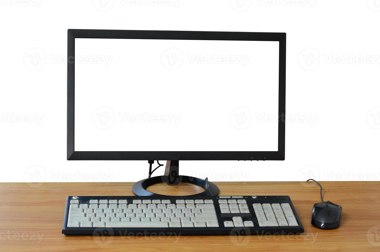 vecchio desktop del computer nella stanza dell'ufficio con lo schermo vuoto foto