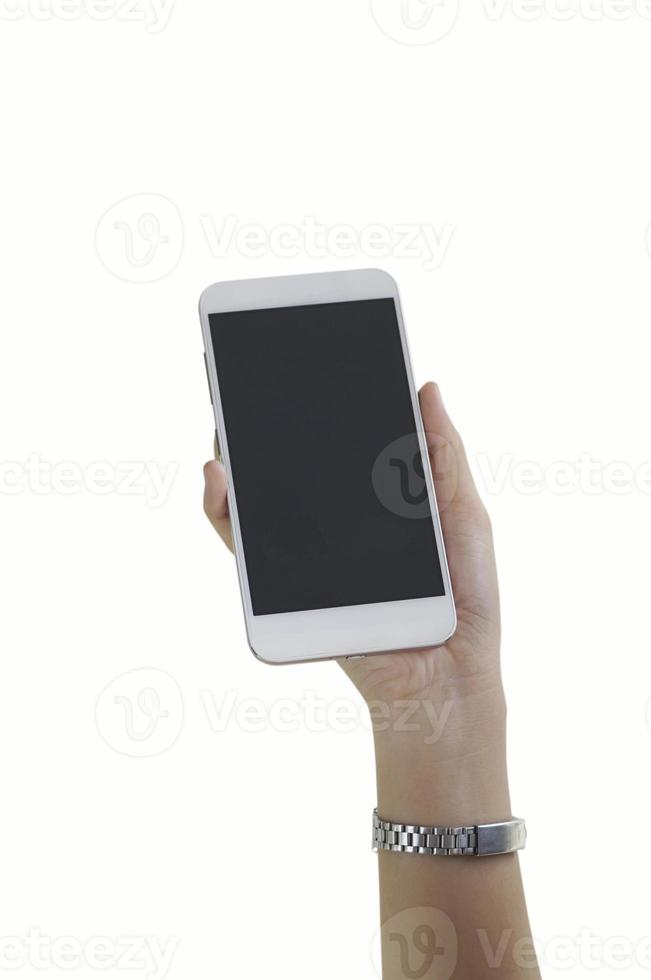mano della donna che tiene un telefono bianco su sfondo bianco foto