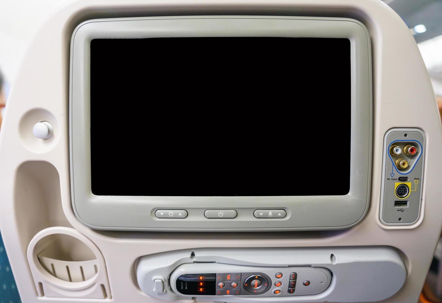 monitor privato nel sedile dell'aereo foto