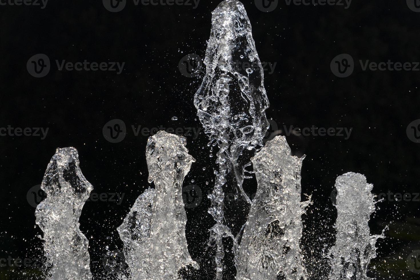 Fontana spruzzo acqua dettaglio vicino su foto
