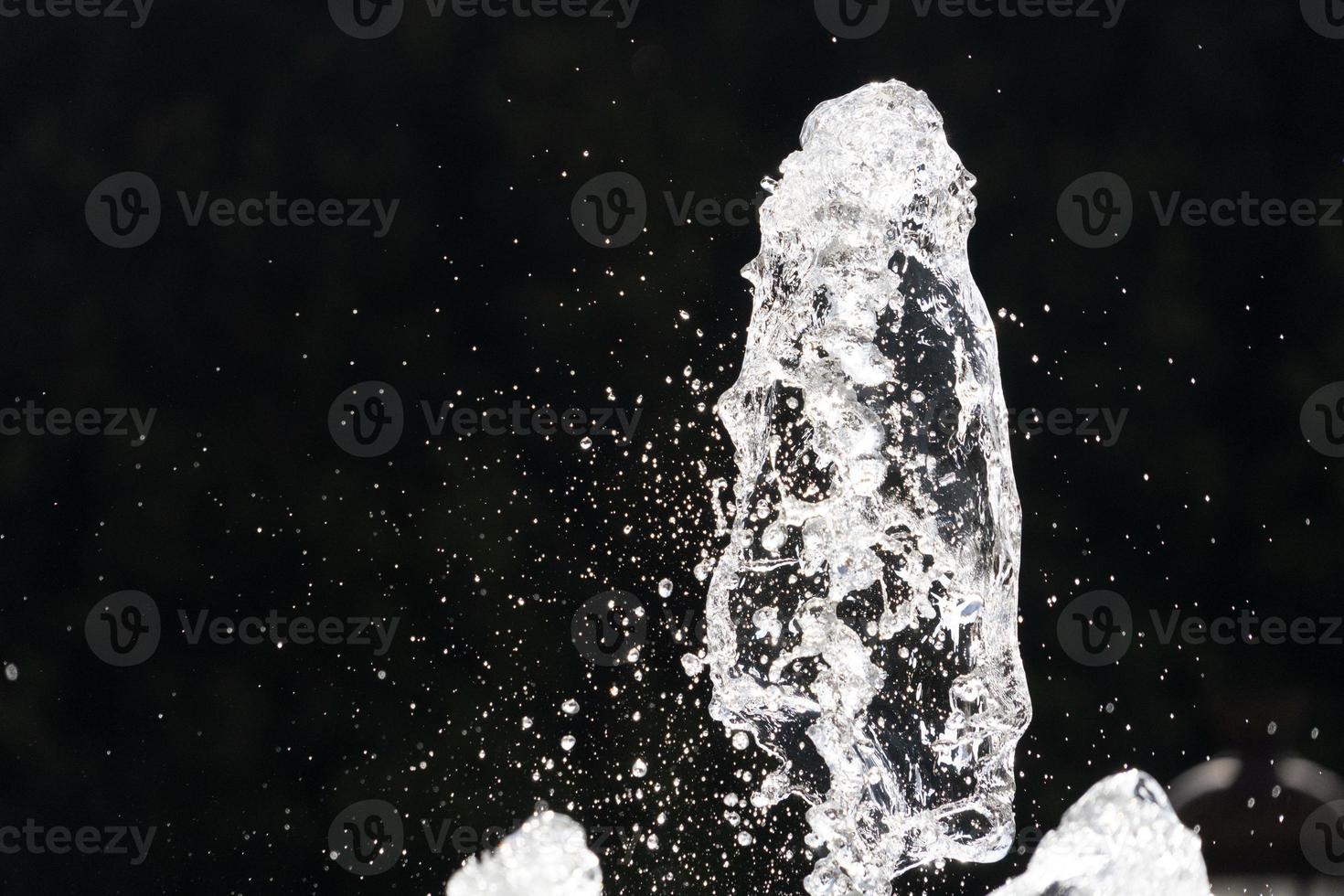 Fontana spruzzo acqua dettaglio vicino su foto