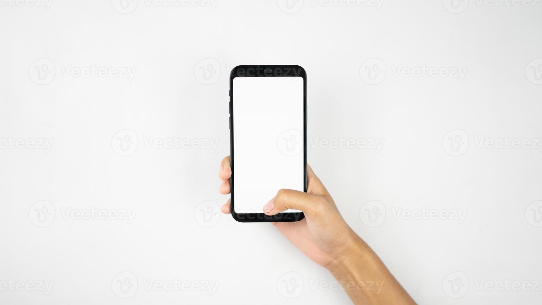 mano Tenere vuoto smartphone per mockup foto