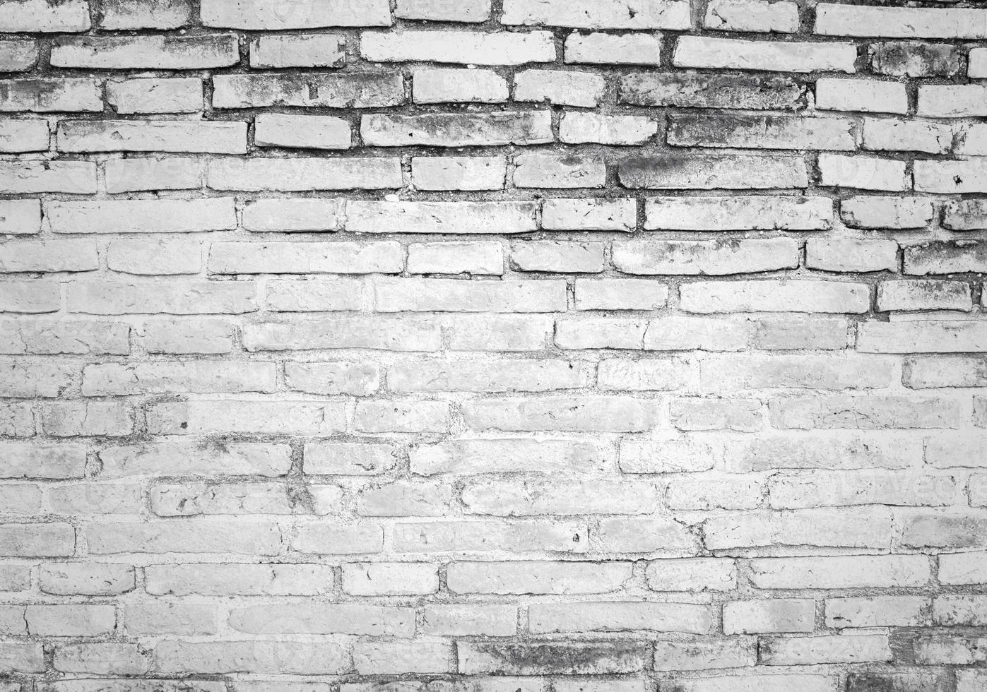 muro di mattoni bianco e grigio trama foto