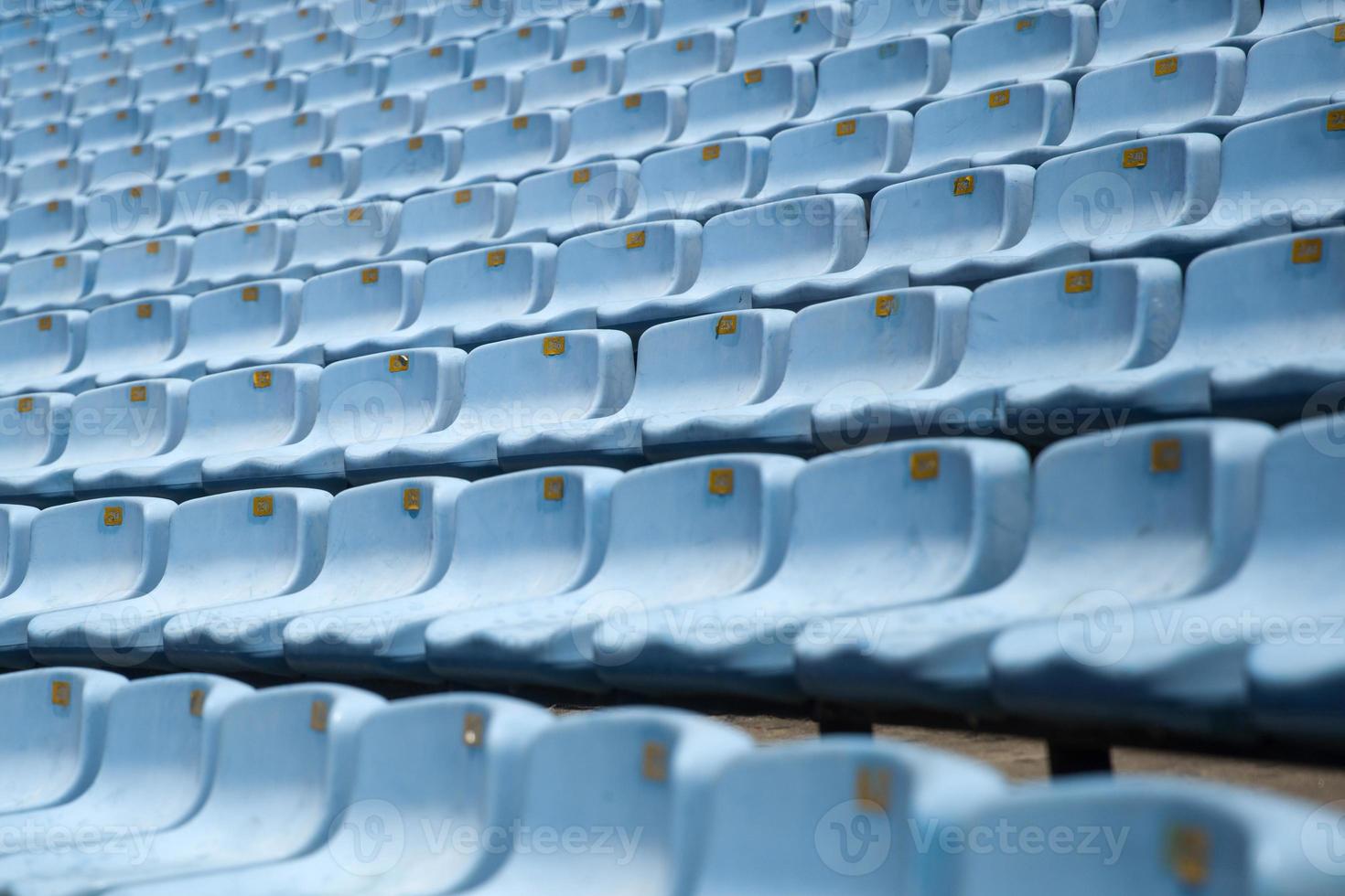 primo piano dettaglio dei sedili dello stadio blu foto