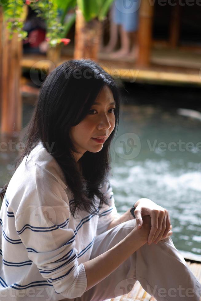 asiatico femmina Sorridi espressione foto