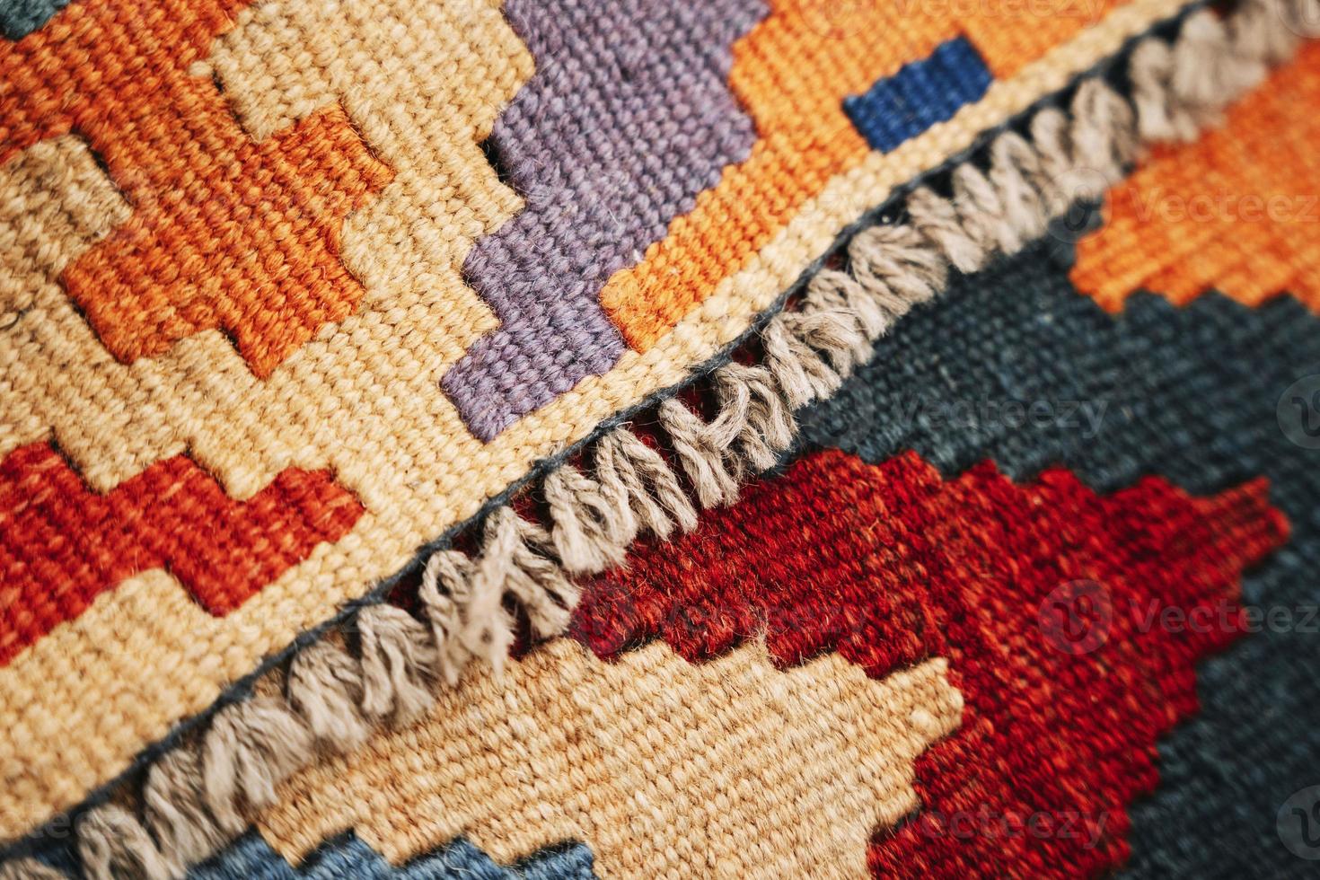 colorato tappeto casa tappeto struttura, accogliente caldo Rivestimento foto