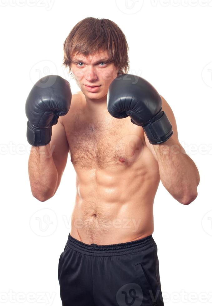 uomo pugile con nero boxe guanti. foto