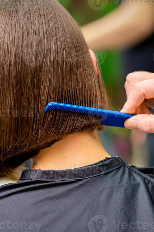 parrucchiere pettinatura capelli di donna foto