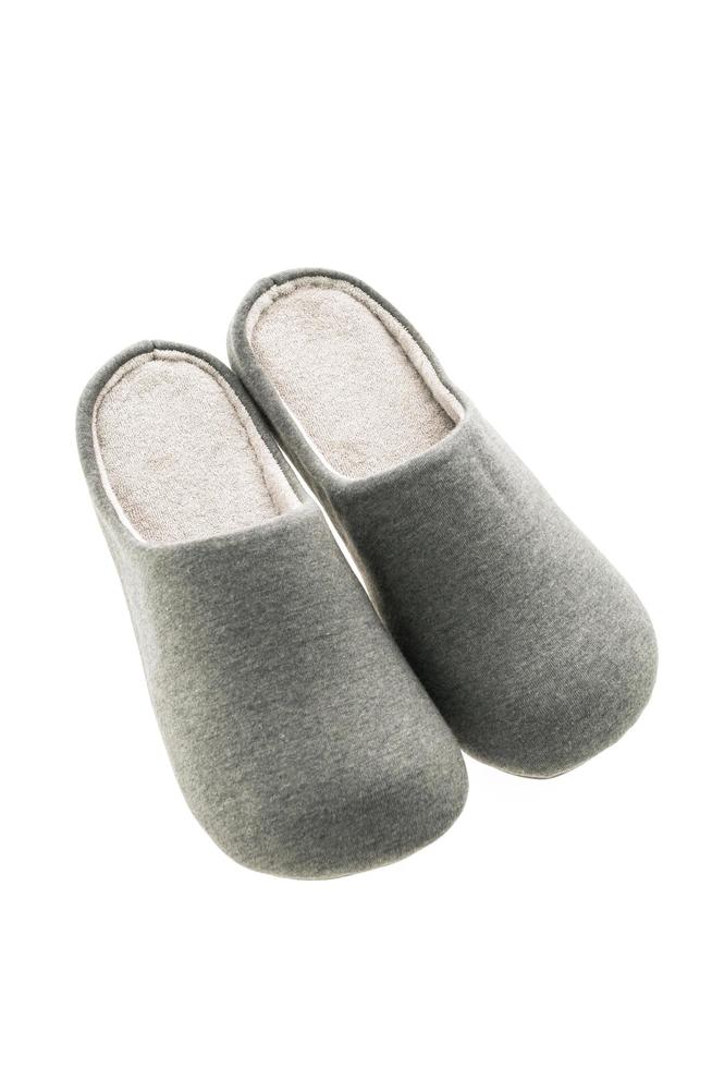 pantofole grigie su sfondo bianco foto