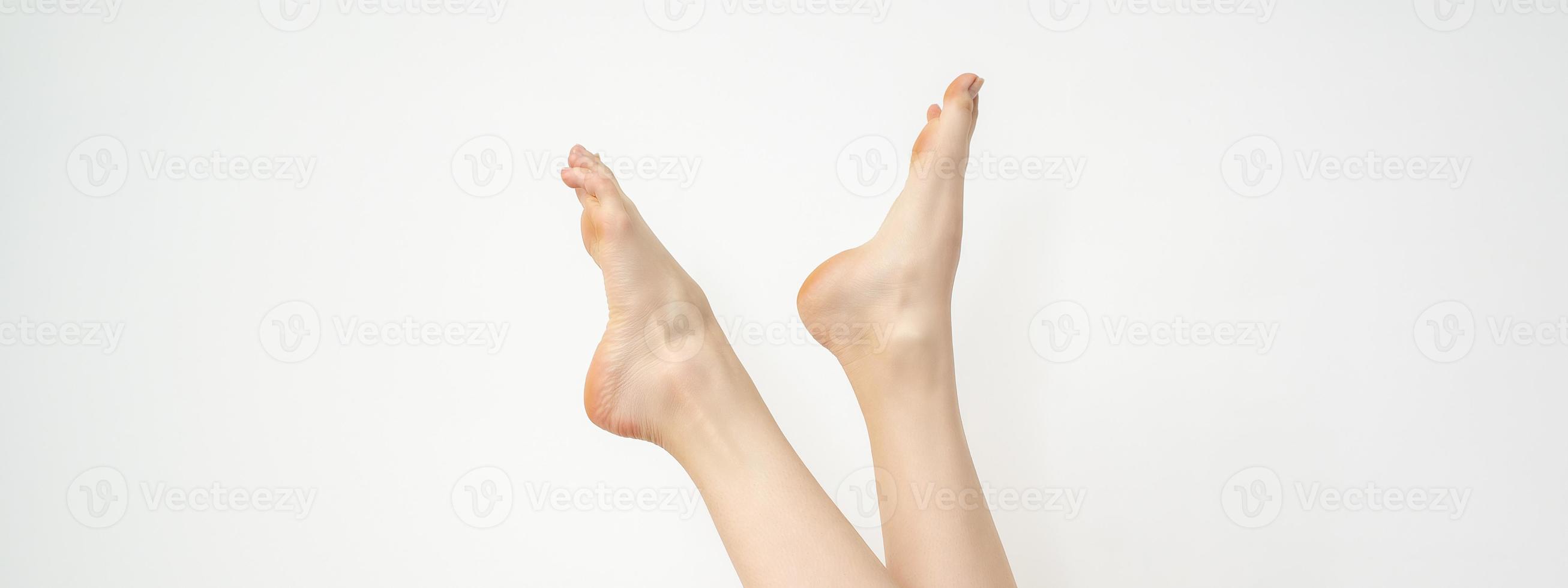 femmina bellissimo snello bianca piedi foto