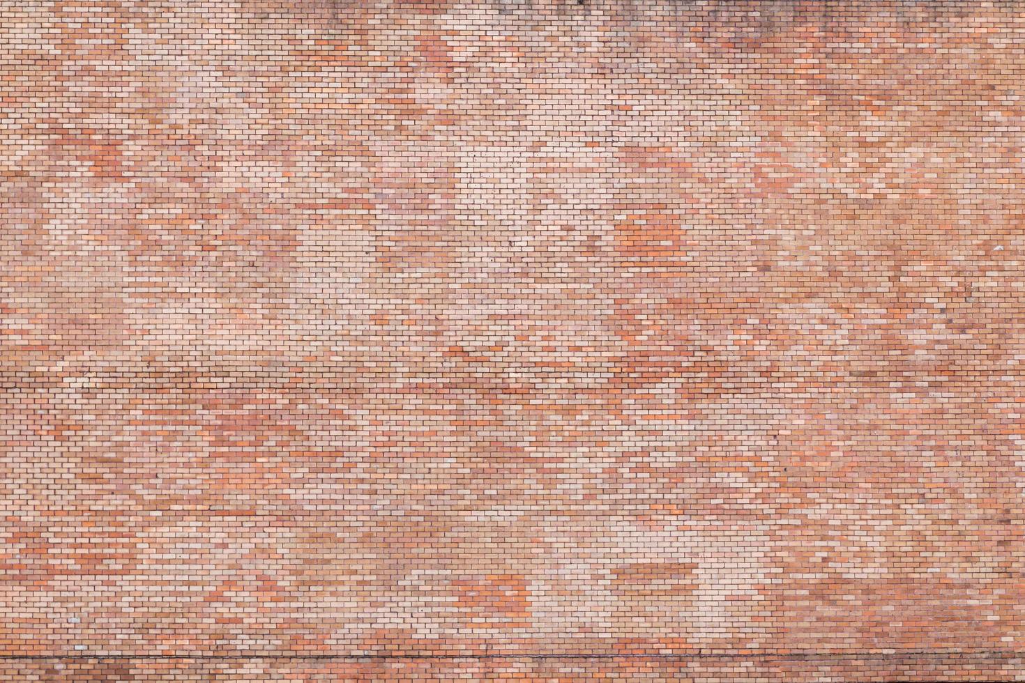 vecchio muro di mattoni texture di sfondo foto