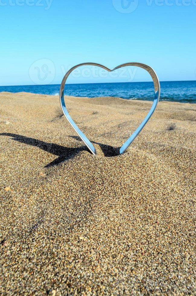 cuore nella sabbia foto