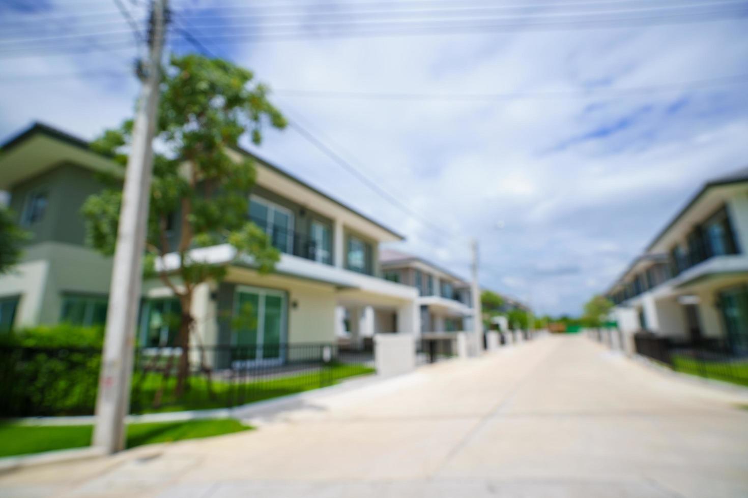 sfocatura astratta e sfondo bokeh di quartiere residenziale foto