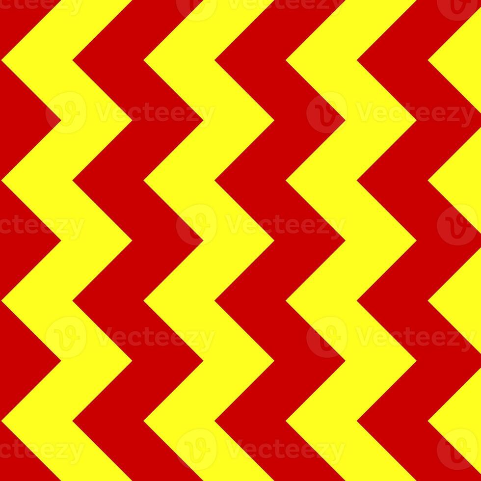 classico rosso e giallo gallone senza soluzione di continuità modello. senza soluzione di continuità zig zag modello sfondo. regolare struttura sfondo. adatto per manifesto, opuscolo, volantino, sfondo, carta, eccetera. foto