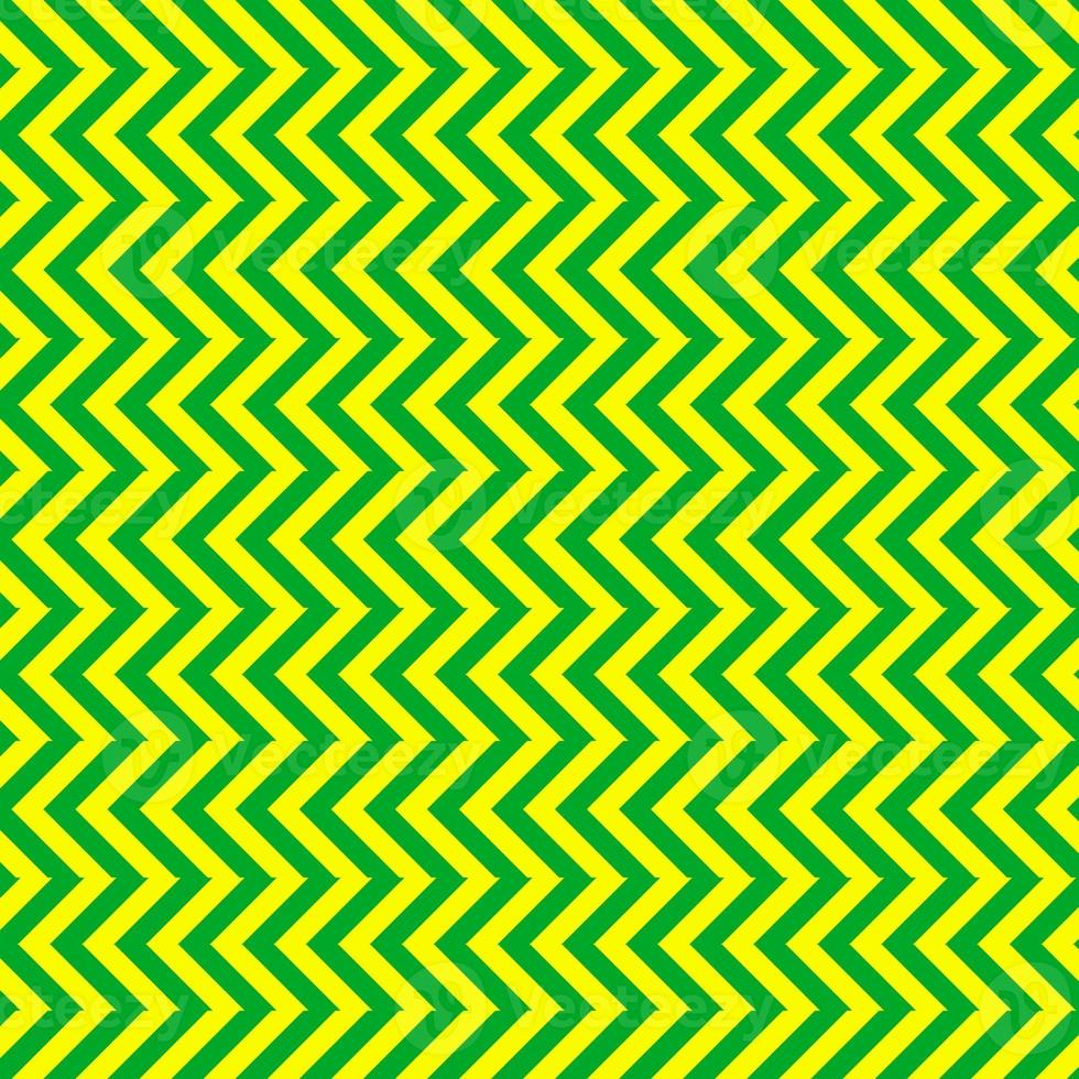 classico verde e giallo gallone senza soluzione di continuità modello. senza soluzione di continuità zig zag modello sfondo. regolare struttura sfondo. adatto per manifesto, opuscolo, volantino, sfondo, carta, eccetera. foto