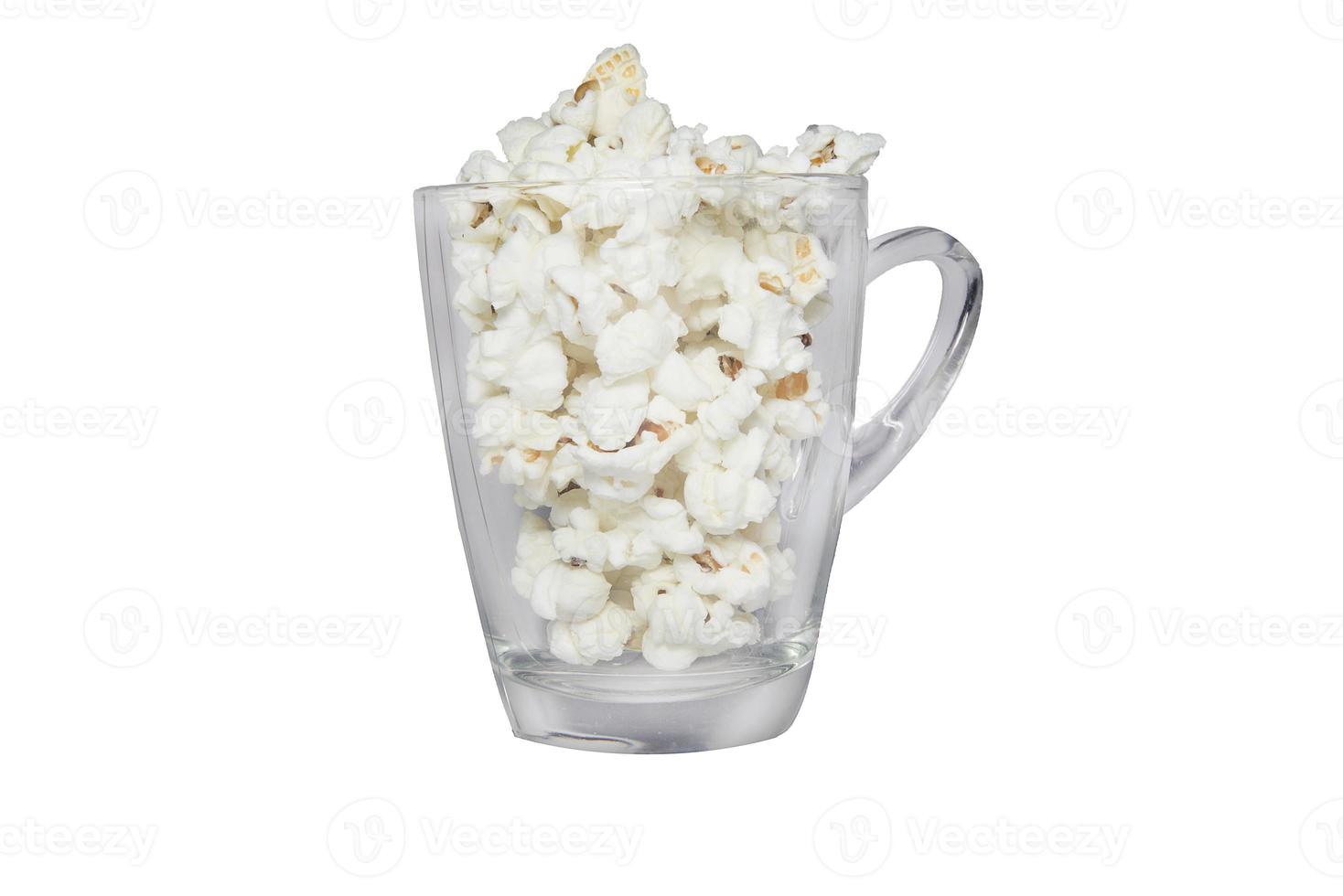 Popcorn nel bicchiere con bianca sfondo foto