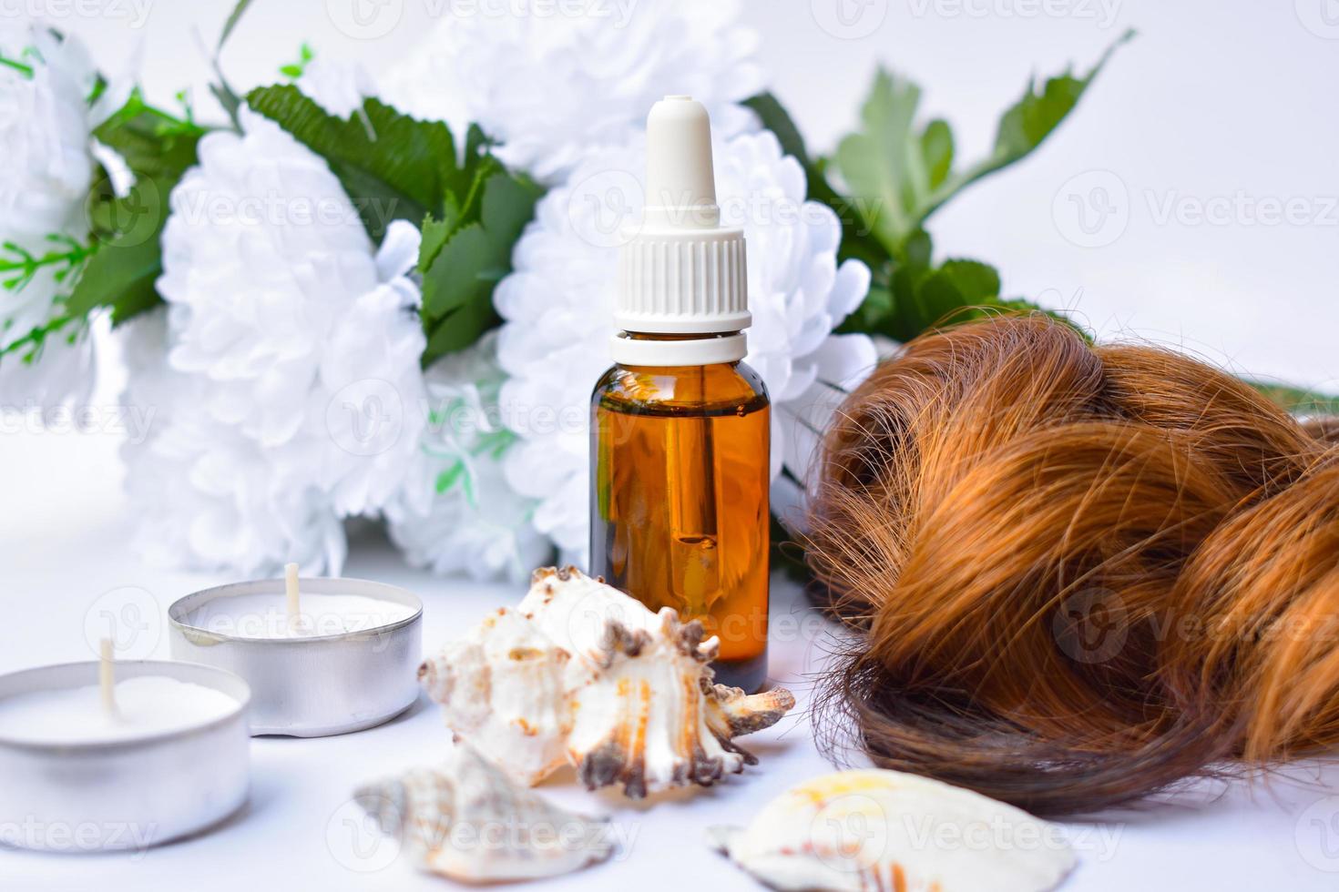 cornice della cura dei capelli con olio di argan, sfondo del prodotto foto