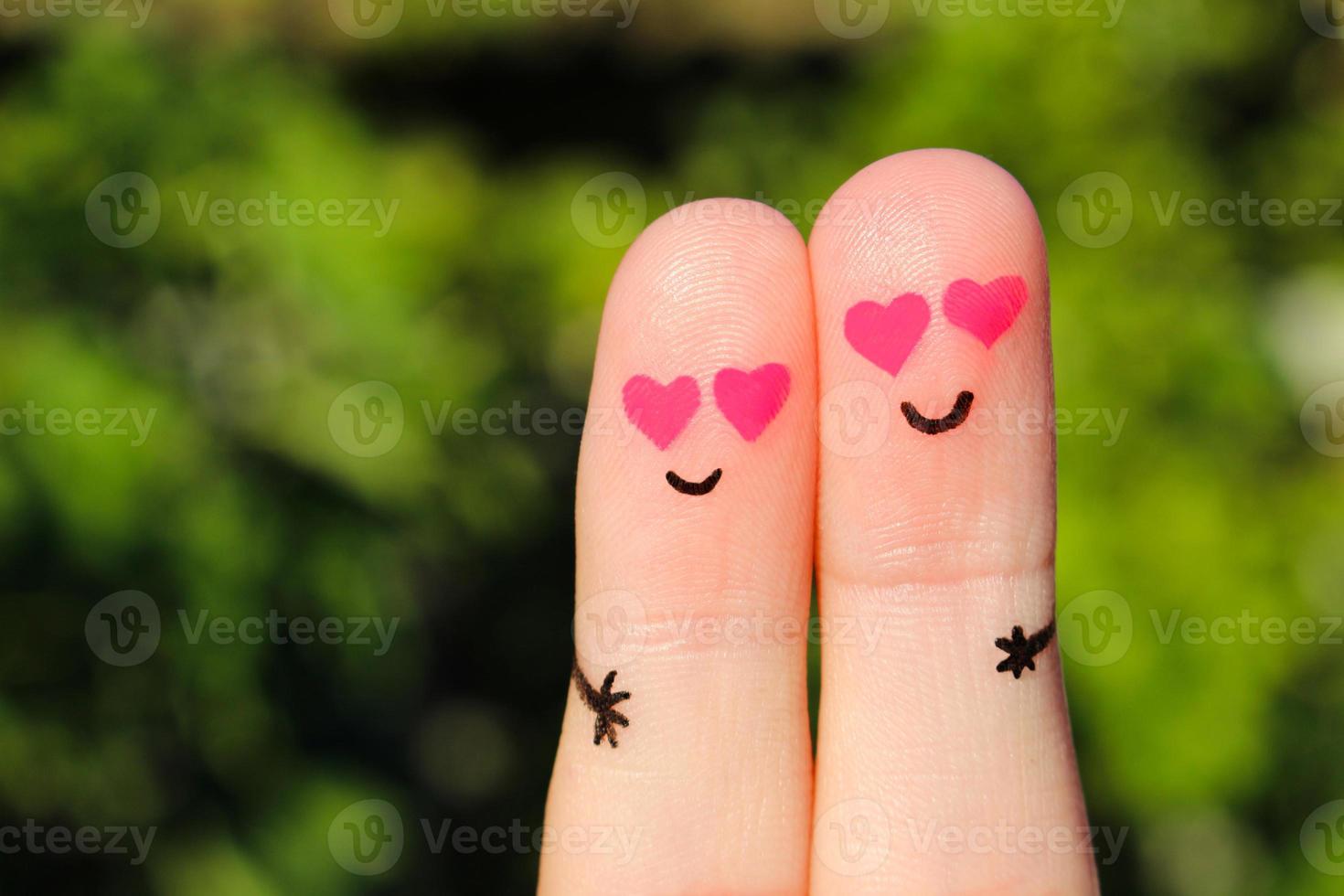 dito arte di un' contento coppia. un' uomo e un' donna abbraccio con rosa cuori nel il occhi. foto