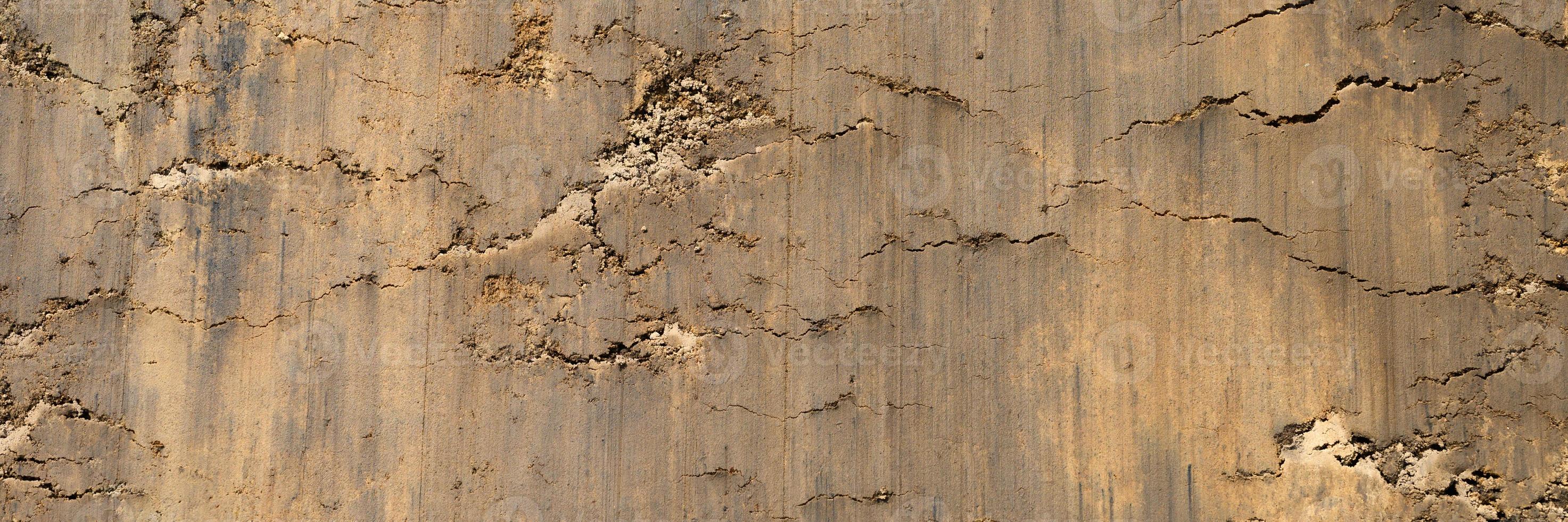 trama di sfondo dalla superficie sciolta del suolo di sabbia e terra foto