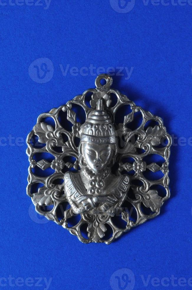 argento medaglione su blu sfondo foto