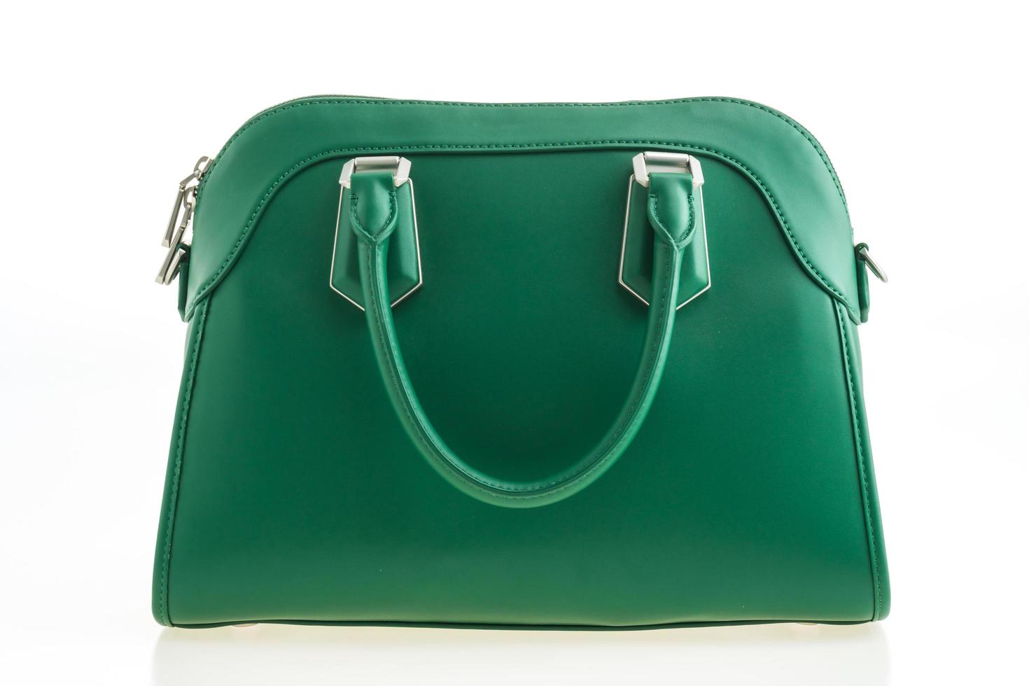 bella eleganza e borsetta verde moda di lusso foto