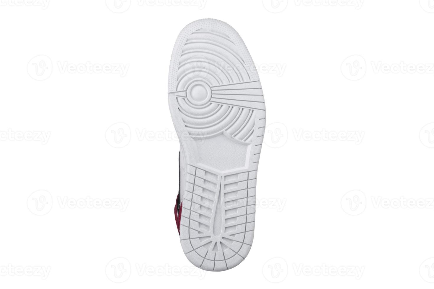 bianca suola di scarpe. parte inferiore di scarpe da ginnastica su un' bianca sfondo è isolato. foto