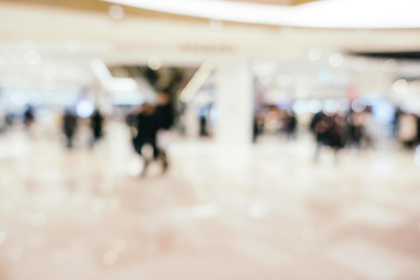 sfocatura astratta centro commerciale di grandi magazzini interni foto