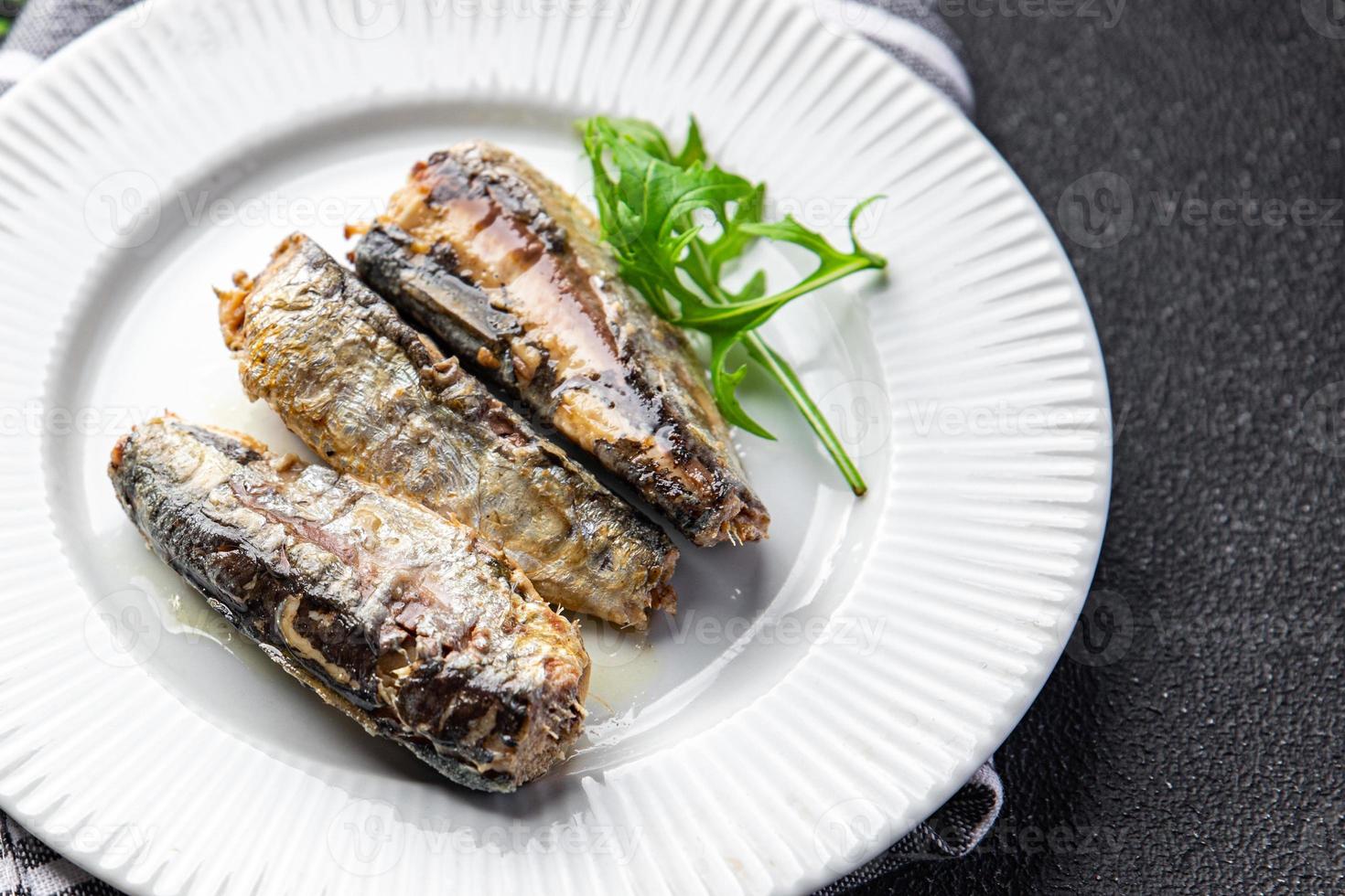pesce sardina in scatola frutti di mare pasto cibo merenda su il tavolo copia spazio cibo sfondo rustico superiore Visualizza foto