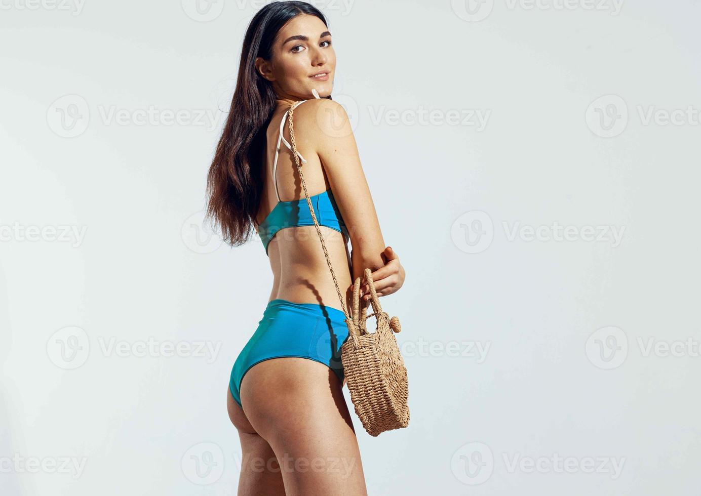 donne nel costumi da bagno spiaggia Borsa bikini in posa fascino viaggio foto